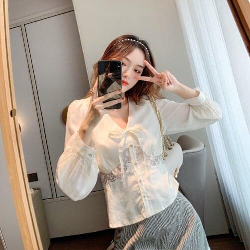 Autumn new style French design sense hollow stitching V-neck shirt lace stitching chiffon shirt top