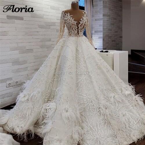 Luxury Glitter Wedding Dresses Saudi Arabia Feathers Beading Bridal Gowns 2020 Robe De Mairee Turkish Puffy Pearls Bride Dress