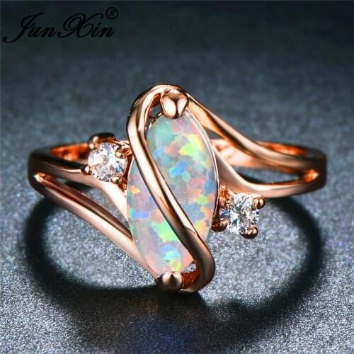 JUNXIN Unique S Shaped Blue/White Fire Opal Stone Rings For Women Rose Gold Horse Eye Rainbow Birthstone Ring Wedding Jewelry