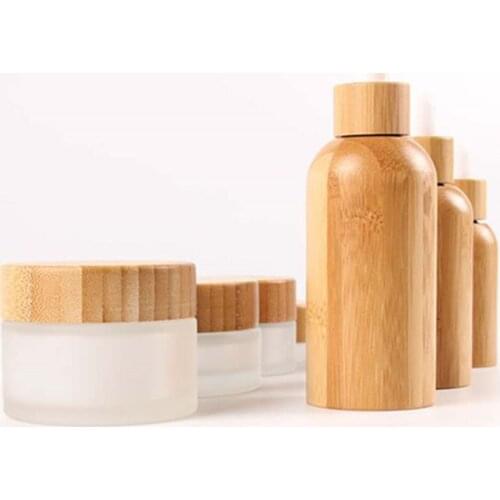 Wholesale Customized Face Cream Cosmetic Packaging Jar With Bamboo Lid Body Cream CBD Herb Cream Glass Skin Care Container Jar