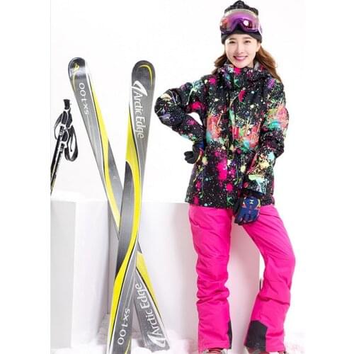 Women Waterproof 10K Ski Suit Female Riding Climbing Skiwear Black Graffiti Jacket And Rose Red Suspender Pants Set
