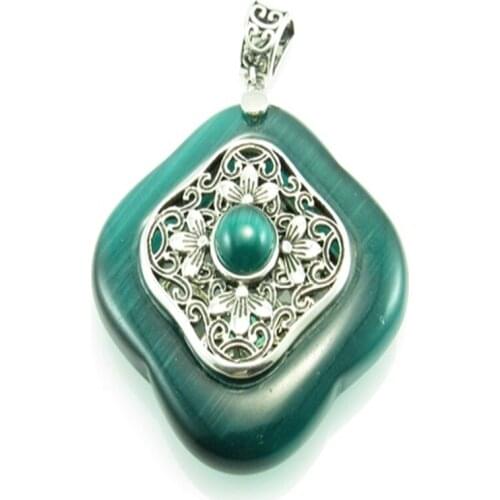Old Silver Pendant with green stone cats eye a precious jewel for women who love accessories