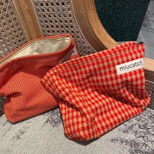 2021 European and American new orange red large red womens large capacity Cosmetic Bag Canvas Cosmetic finishing storage bag