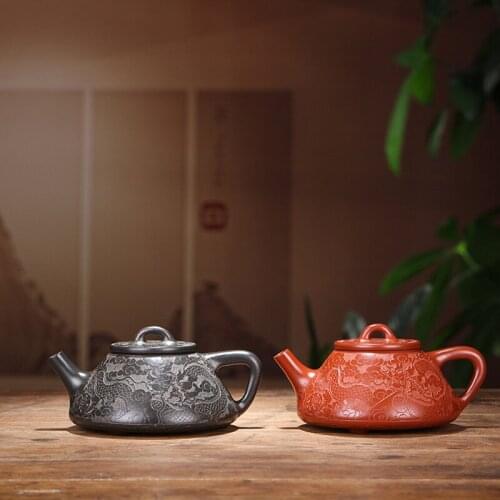 Yixing recommended mixed batch of half dahongpao carved by hand painted dragon trace 266 cc ladle pot teapot of kung fu