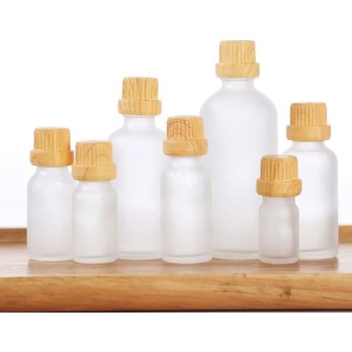 360pcs/lot Wholesale Frost Clear Essential Oil Refillable Glass Bottle With Bamboo Cap 5ml 10ml 15ml 20ml 30ml 50ml 100ml