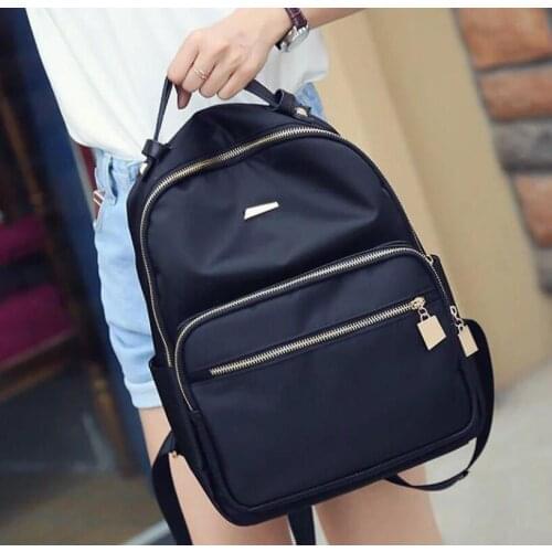 Popular 2010 New Korean womens bag Oxford cloth backpack waterproof nylon travel student bag