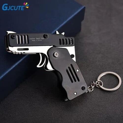 Mini Folding Stainless steel Rubber Band Launcher Gun Hand Pistol Guns Shooting Toy Gifts Boys Outdoor Fun Sports For Kids