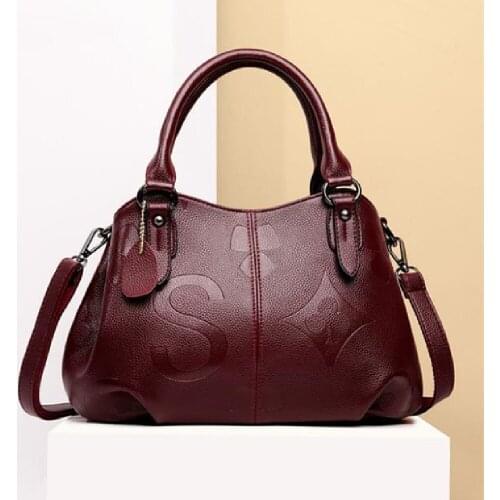 2021 The new lady handbag fashion solid color embossing simple atmosphere shoulder bag large capacity multifunctional handbag