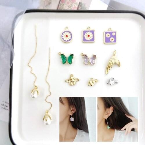 Color-preserving alloy small daisy butterfly pearl bud small angel one arrow pierced heart DIY earrings bracelet pendant