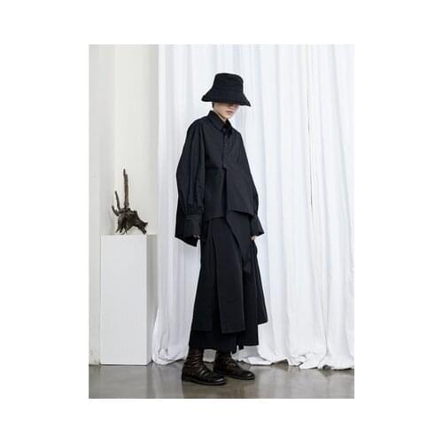 Autumn new small design dark black series skew after the asymmetric split long shirt