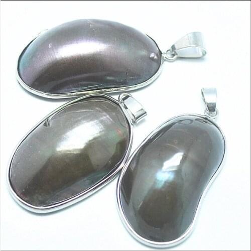 Natural dark brown shell pendants from ocean seawater for new tourism collections items selling by piece shell gifts