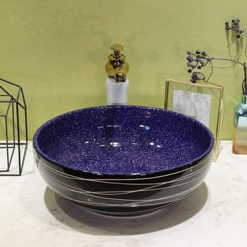 China Artistic Porcelain Handmade Embossed Ceramic Lavabo Bathroom Vessel Sinks wash basin bathroom blue with black