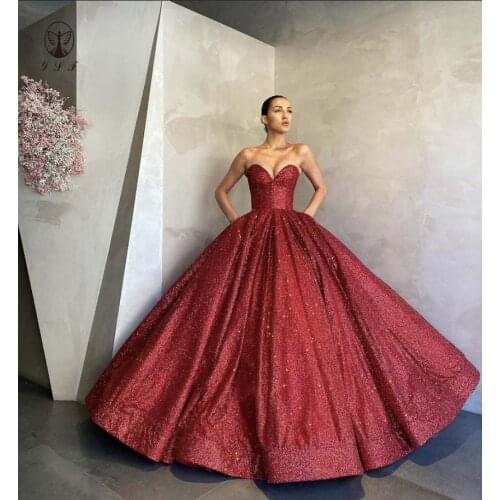 2021 Elegant Sweetheart Sleeveless Blnig Bling Glitter Fabric Ball Gown Red Puffy Quinceanera Dresses