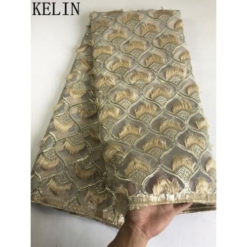 New high quality African Gold tissue feather lace fabric French lace with sequined material for the wedding OFN016