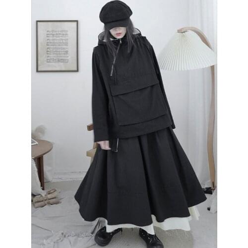 Spring and Autumn new solid color black and white patchwork design half skirt for women fashion minority A skirt for women