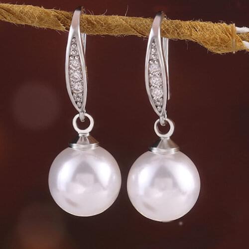 HUAMI Popular Big Simulated Pearl Drop Earrings Korea Fashion Hook Earrings Jewelry Silver Color Beads Female Orecchini 2021