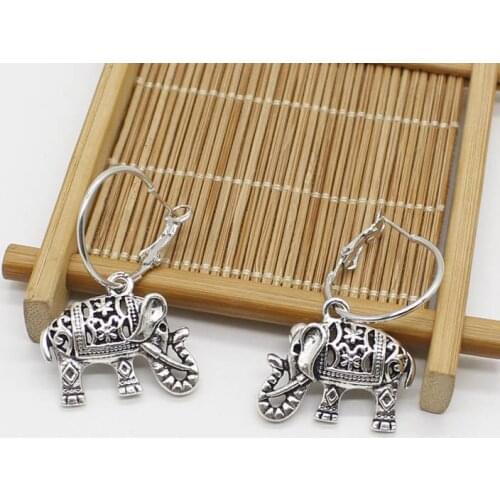 Fashion retro hollow elephant pendant earrings, metal hoop earrings, charm animal silver-plated earrings Women gift jewelry