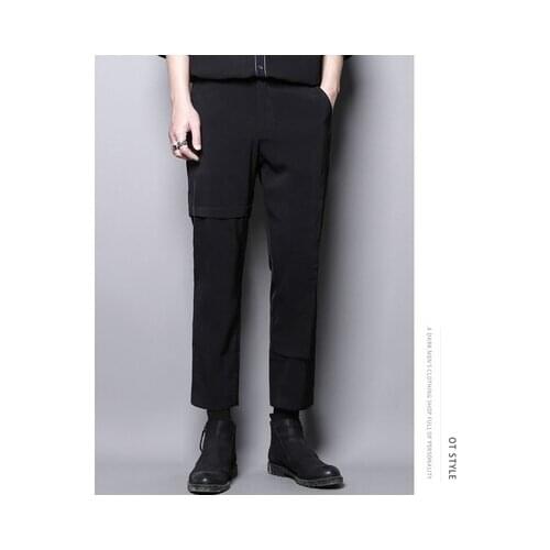 Dark personality high-level design sense of asymmetric splicing false two casual pants nine-minute small pants men slim pants