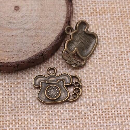 Free shipping 29pcs 22x18mm antique bronze phone charms diy retro jewelry fit Earring keychain hair card pendant accessories