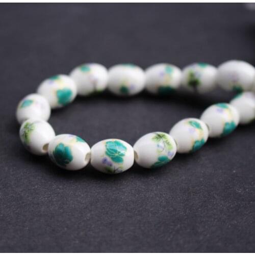 28Pieces Oval Ceramic Beads 10.4mm*8mm White With Green Flowers for jewelry making