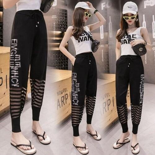 Ladies harem pants bloomers summer Korean version of the large size 100kg loose mesh yarn hot drill casual beam feet harem pants