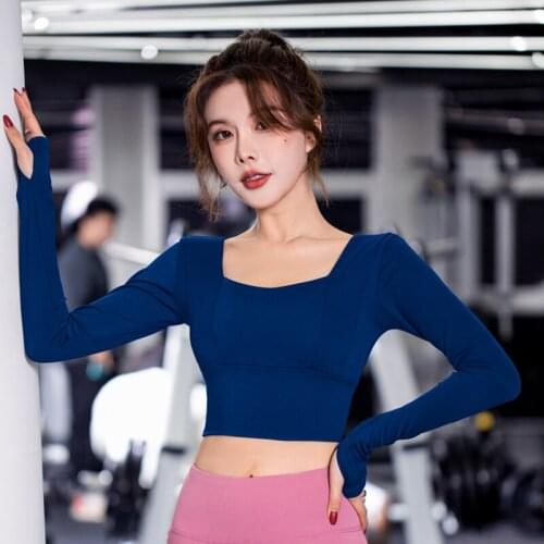 The new fitness short cropped yoga clothes stretch slim sports long-sleeved top with bra pad blouse women