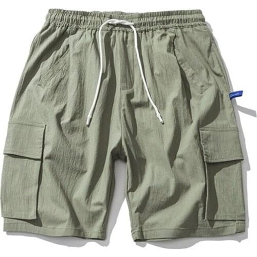 Japanese mens solid color three-dimensional large pocket tooling fashion street tide brand loose straight casual 5 pants