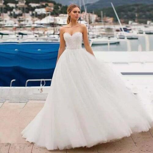 Wedding Dresses Plus Size Sleeveless Lace Appliques Bride Dress Lace Up Back Ivory Wedding Gowns Lace Up