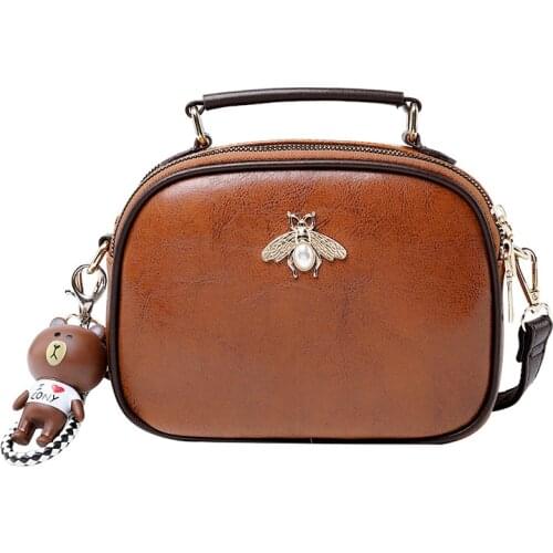 Fashion portable womens bag small round bag 2020 autumn and winter new fashion portable small bag simple wild bee bag tide bag