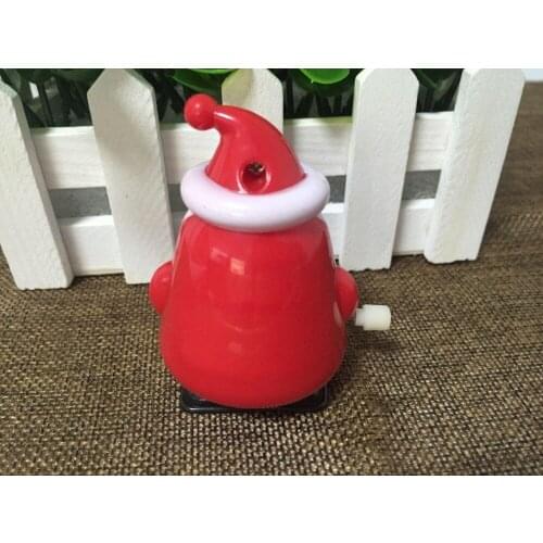 Specializing in the production of plastic toys gifts clockwork chain old Christmas gifts on milk candy toys