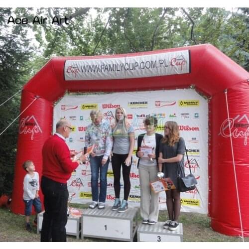 Red inflatable arch wall with removable logo for award ceremony