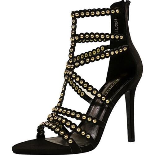 European and American fashion high-heeled summer womens shoes hollow open toe metal rivet Roman shoes sandals
