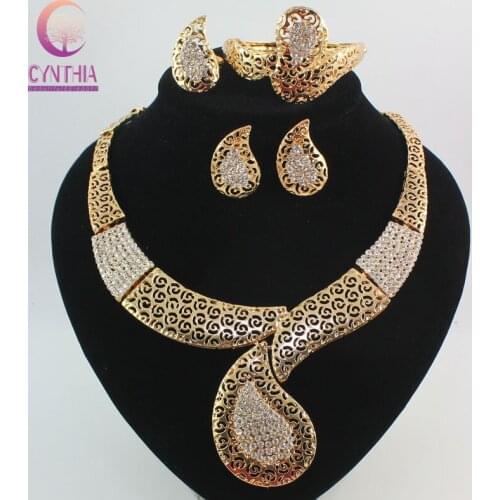 African Costume Jewelry Sets gold color Crystal Women Fashion Wedding Bridal Accessories Necklace Bangle Earrings Ring Set