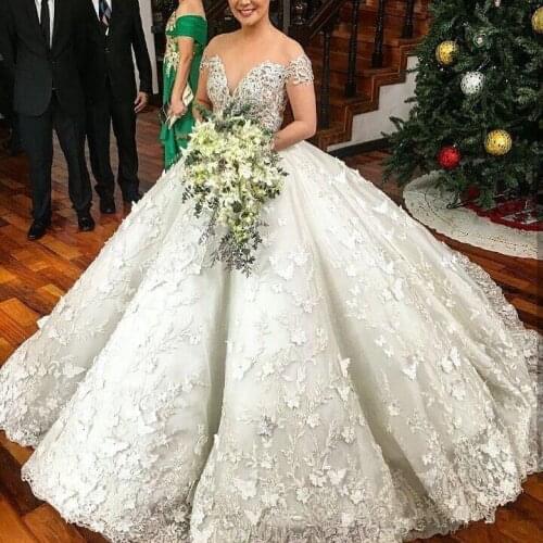 Luxury Beaded Lace Ball Gown Wedding Dresses Sexy Sheer Neck Short Sleeves Appliqued Saudi Arabic Bridal Gowns Custom Made