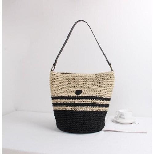 Summer new pure hand-woven bag primary color straw bag beach vacation woven striped handbag