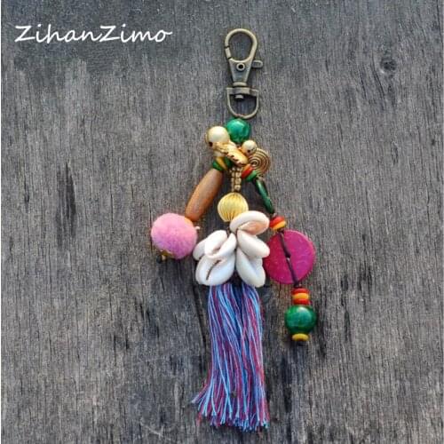 Creative Hairball Tassel Keychain Shell Bell Pendant Female Bag Pendant Alloy Car Key Chain Ring Accessories