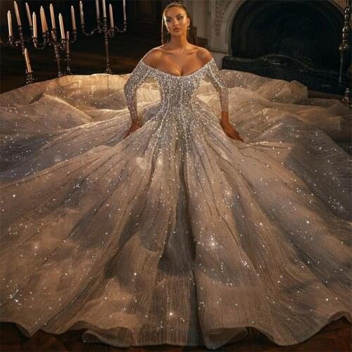 Luxury Champagne Wedding Dresses Crystal Pearls Bridal Gowns Glitter Dubai Long Sleeves Off Shoulder Robe de mariée Custom Made
