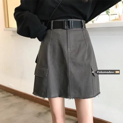 Korean style short skirt womens 2021 spring and autumn new high waist double-pocket fringed all-match Hong Kong-style skirt