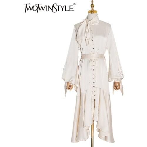 TWOTWINSTYLE Asymmetrical Lace Up Dress Female Stand Collar Flare Sleeve High Waist Hollow Out Midi Dress Women 2020 Fashion New