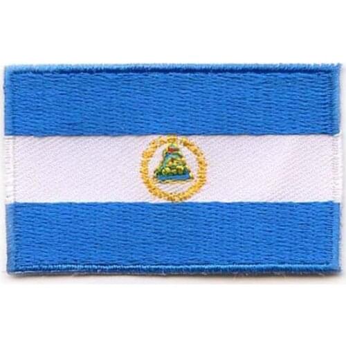 2.5",area over 80%,6189,Nicaragua,100pcs/bag,MOQ50pcs,emb patch,merrow & flat broder,iron on backing,free shipping by Post