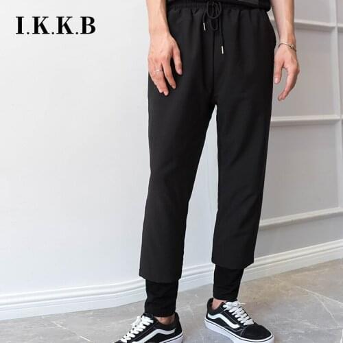 M-4XL spring and autumn models fake two-piece pants mens wide-leg pants Japanese tide models loose nine-point pants casual pant