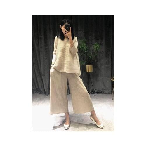 HOT SELLING Miyake fold solid three quarter o-neck loose and irregular T-shirt + wide leg pants suit IN STOCK