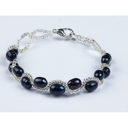 The new bracelet female French retro flower plate hollow niche design bracelet natural pearl bracelet double row hand jewelry