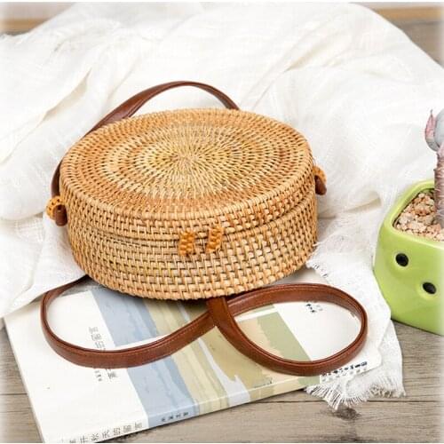 Naxi.Hani Women's Round Bags