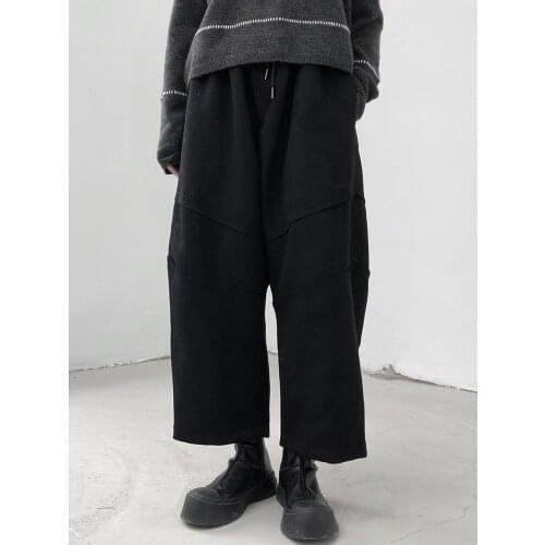 Winter new womens wool fabric thickened patchwork casual pants pure color loose wide leg pants riser pants