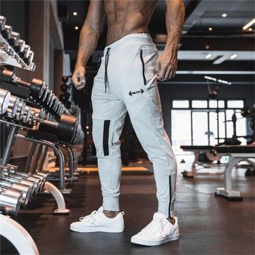 Mens cotton exercise gym pants casual fashion exercise muscle mens fitness pants high quality jogging pants tight pants