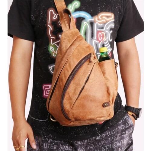 Free shipping.wholesales.fashion genuine leather bag.quality cowhide schoolbag.vinatge bag.bikers bag.messenger bag