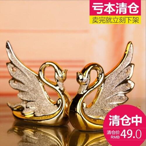 The two Home Furnishing Pui jewelry gold-plated Swan ceramic decoration decoration room frosted wedding gift