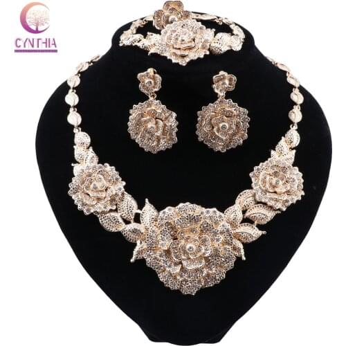 CYNTHIA Gold Color Crystal Rhinestones Flower Shaped Necklace Earrings Bracelet Ring Sets African Bridal Jewelry Sets