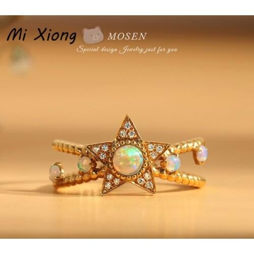 Mi Xiong s925 sterling silver opal gemstone designer craft star winding ring ladies light luxury fresh charm brand jewelry